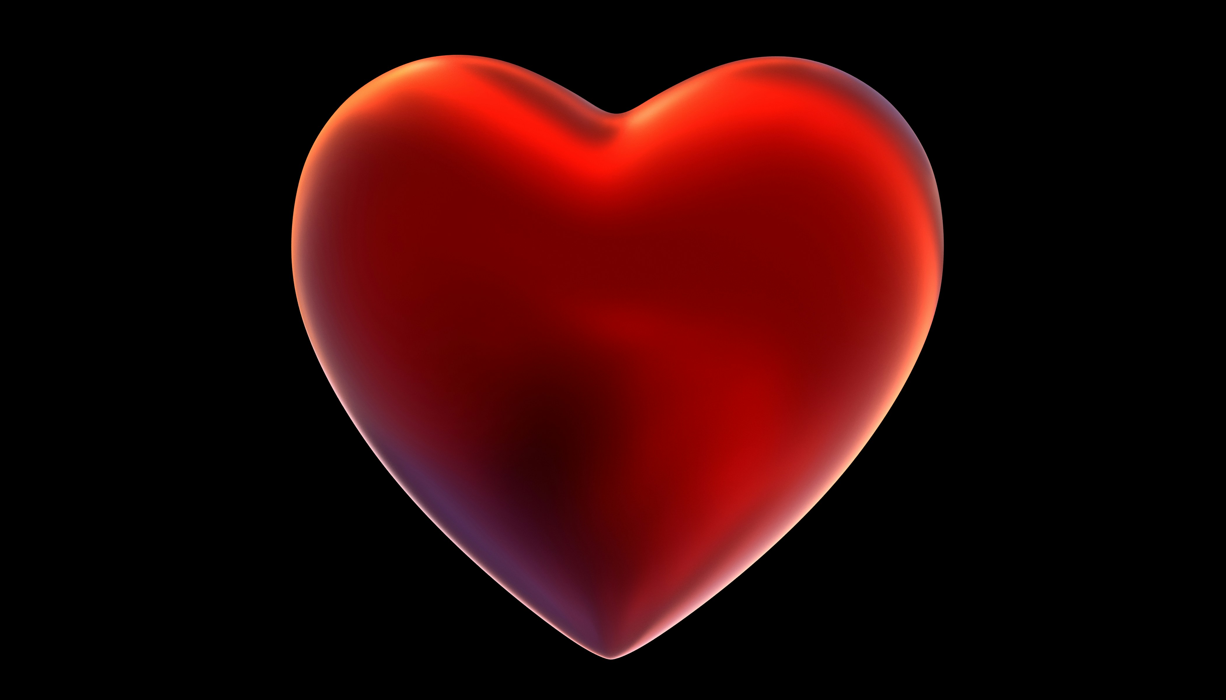 red heart on black background